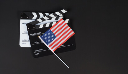 Usa flag and two Clapper board on black background