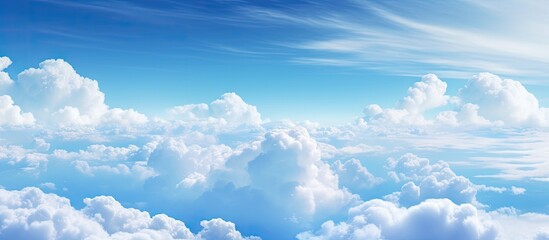 Poster - The blue sky transitioning with white clouds can be incorporated as the backdrop with copy space image.