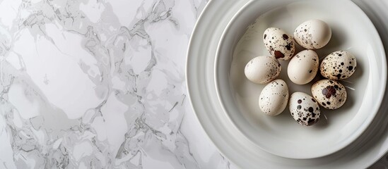 Poster - White porcelain plates presented with a display of quail eggs, ideal for showcasing with a copy space image.