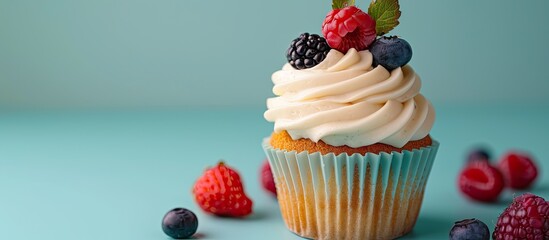 Poster - Decorated cupcake with berry garnish on top, perfect for an ad with copy space image.