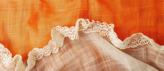 Fototapete - Natural linen with lace ribbon against a vibrant cloth backdrop, creating a border frame for a copy space image.