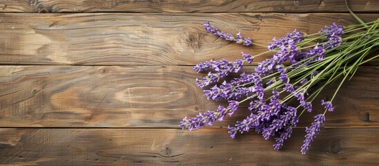 Poster - Lavender bouquet displayed on rustic wooden table with copy space image.