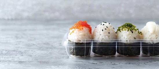 Poster - Japanese Onigiri set displayed in a transparent plastic container with a blank space for additional images.