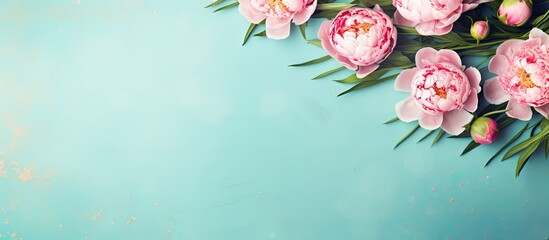 Poster - Trendy top view Mother's Day greeting card design featuring pink peony flowers on a blue mint background with paper confetti and copy space image, suitable for summer birthdays or anniversaries.