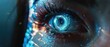 © Purichaya - Close up of a futuristic human eye with digital and neon light effects, representing advanced technology and cybernetic enhancements.