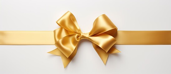 Aufkleber - White background with two gold silk ribbons in different styles, elegantly arranged, finishing in a bright gold bow, creating a picturesque copy space image.