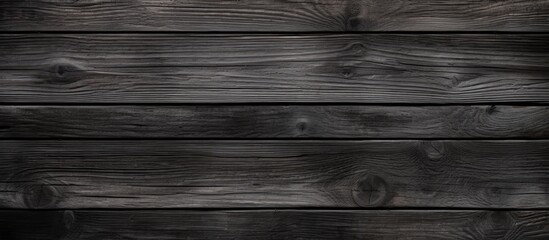 Wall Mural - Rustic dark wooden texture with an old black and grey color palette creating a captivating wood background, perfect for a copy space image.