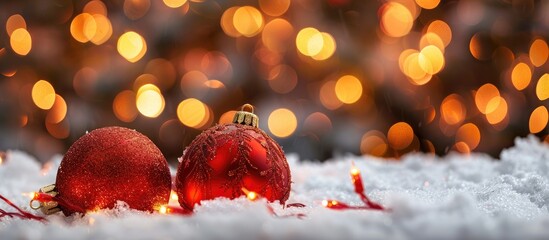Aufkleber - A festive Christmas decoration featuring balls in the snow with a blurred background of twinkling holiday lights, perfect for a greeting card with copy space image.