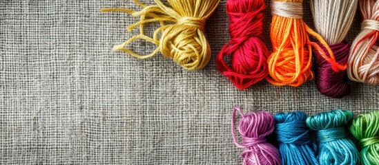 Poster - Embroidery kit with colorful threads and canvas background for stitching, with room for a copy space image.