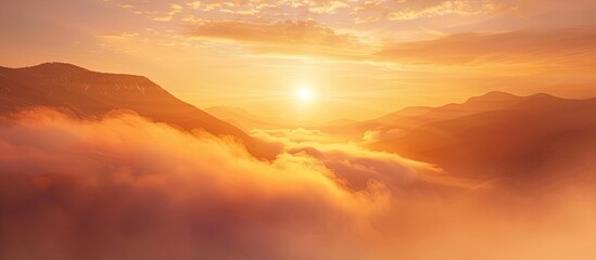 Poster - A stunning sunrise in the mountains with a large fog floating over the high mountain scenery, creating a captivating copy space image.