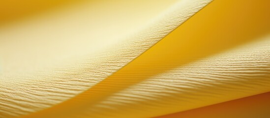 Poster - Macro photograph of a close-up view of a yellow textured paper background with a focus on the intricate details, suitable for use as a copy space image.