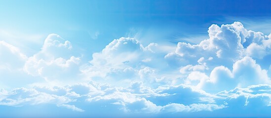 Poster - blurry sky and clouds with a bright blue gradient background create an abstract backdrop with copy s