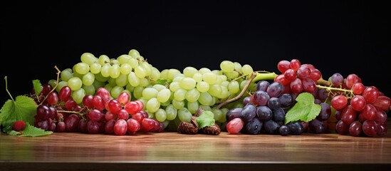 Poster - Various types of grapes are displayed in the copy space image.