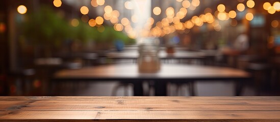Poster - The central focus is an empty brown wooden table set against a blurred Coffee shop background with bokeh effect for showcasing products in a copy space image.