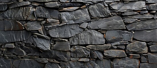 Canvas Print - Stone wall texture with copy space image for dark gray background with a black grunge banner.