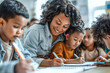 © Svetlana Lerie - African American female teacher and little children in classroom writing or drawing on paper