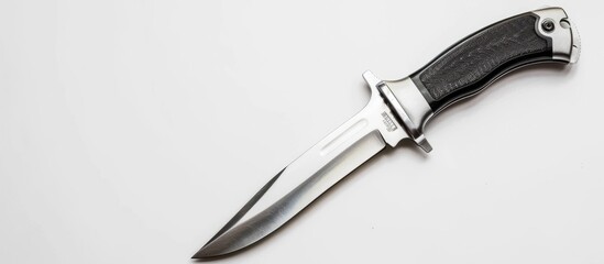 Poster - Stainless steel tactical hunting knife on white background with copy space image