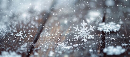 Leinwandbilder - Close up macro shot featuring snowflakes on a vintage wooden backdrop with selected focus ideal as a copy space image