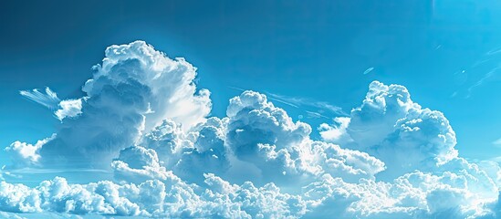 Aufkleber - A panoramic view of a vast blue sky with billowing clouds ideal for copy space image