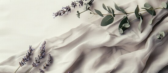 Poster - Mockup of a card with grey linen fabric adorned by dried lavender and eucalyptus flowers offering a pleasant copy space image