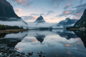 Wall Mural - Milford Sound with Mitre peak and foggy on the lake at Fjordland national park, New Zealand