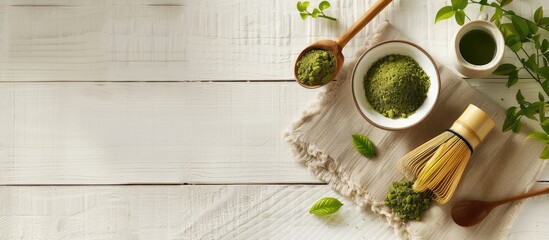 Aufkleber - Traditional Japanese matcha tea setup with accessories arranged around a bowl of matcha powder on a white wooden surface from a top view perspective featuring copy space for an image