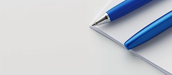 Poster - A blue pen is displayed on a notepad with inspiring messages against a white backdrop allowing space for additional content in the image