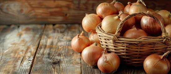 Aufkleber - A wicker basket on a wooden table filled with ripe onions with copy space image