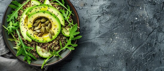Aufkleber - Healthy quinoa salad with avocado arugula zucchini and seeds suitable for plant based clean eating and keto diets Superfood ingredients in a copy space image