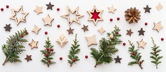 Poster - Festive wooden Christmas decorations and stars arranged on a white background capturing the essence of the Christmas season with a flat lay top view composition featuring copy space image