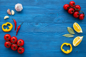 Wall Mural - Creative Cooking layout with tomatoes and spices, top view. Menu concept