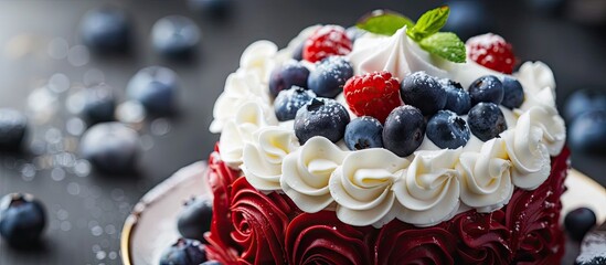 Poster - Red wrapper surrounds cake topped with cream and blueberries in a copy space image