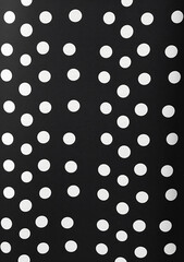 Poster - Black and white polka dot pattern on a black background in the style of a flat lay, top view, with high resolution, high quality, high detail, and high definition.