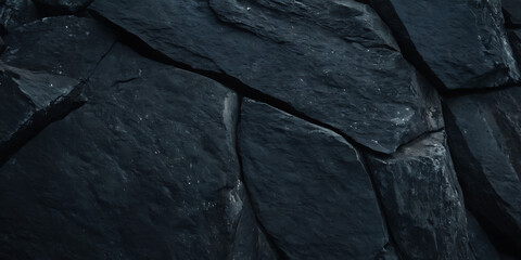 Wall Mural - close-up texture of dark, rough, jagged rocks. ideal for nature, geology, or construction-themed pro