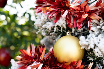 Canvas Print - Background of gold decoration ball on christmas tree with another ornament