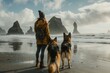 © Suchanon - Person in a coat and hat standing with two dogs on a reflective beach at sunrise