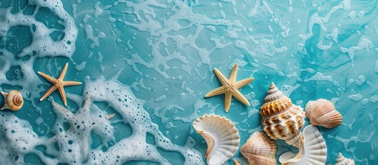 Wall Mural - Summer vacation vibe with seashells starfish and a tranquil blue water backdrop for a relaxing holiday getaway Ideal copy space image for banners