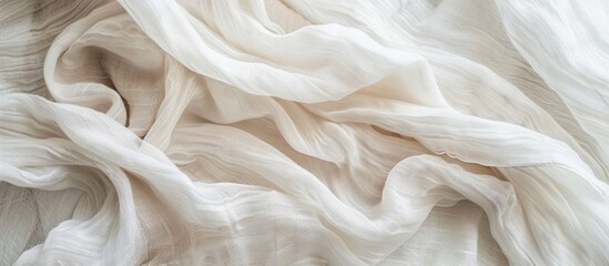 Poster - top view of a white crumpled linen fabric texture background resembling natural organic eco textiles