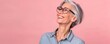 © Dalibor - A woman with glasses is smiling and looking up at the camera. Free copy space for banner.