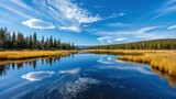 Fototapeta Pomosty - Serene Lake Reflection with Blue Sky and Clouds in Nature Landscape