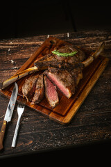 Sticker - sliced rare grilled tomahawk steak