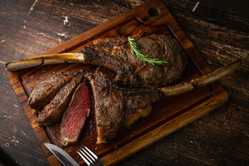 Sticker - sliced rare grilled tomahawk steak