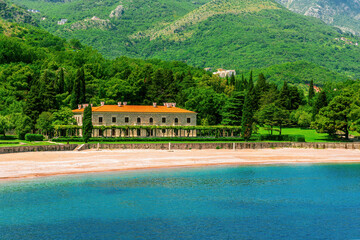 Wall Mural - awesome landscape of sea gulf with beautiful turquoise water with amazing green forest shore wwith pakr and hotel and nice green mountains on background