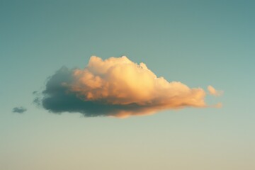 Fototapete - A solitary cloud drifting through a clear blue sky with no land or horizon in sight