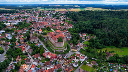 Wall Mural - Aerial view of the old town of Cadolzburg in Germany, on a cloudy day in late spring.