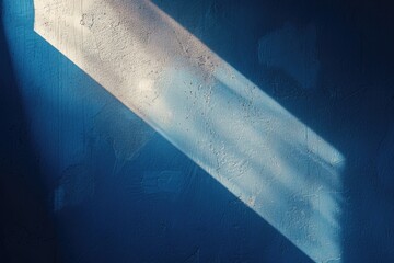 Wall Mural - A blue wall with a window shadow, great for interior or exterior design photoshoots