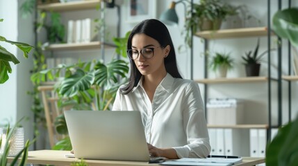 Canvas Print - The woman at office desk