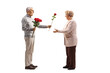 © Ljupco Smokovski - Full length profile shot of an elderly man giving a red rose to a senior woman