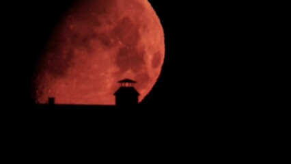 Wall Mural - Halloween witchcraft concept full moon movement wrapped with dark sky. Atmospheric dark night sky with moon for mystic thriller mood concept.