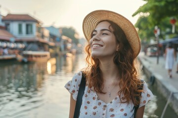 Happy woman enjoying a sightseeing tour in riverside town